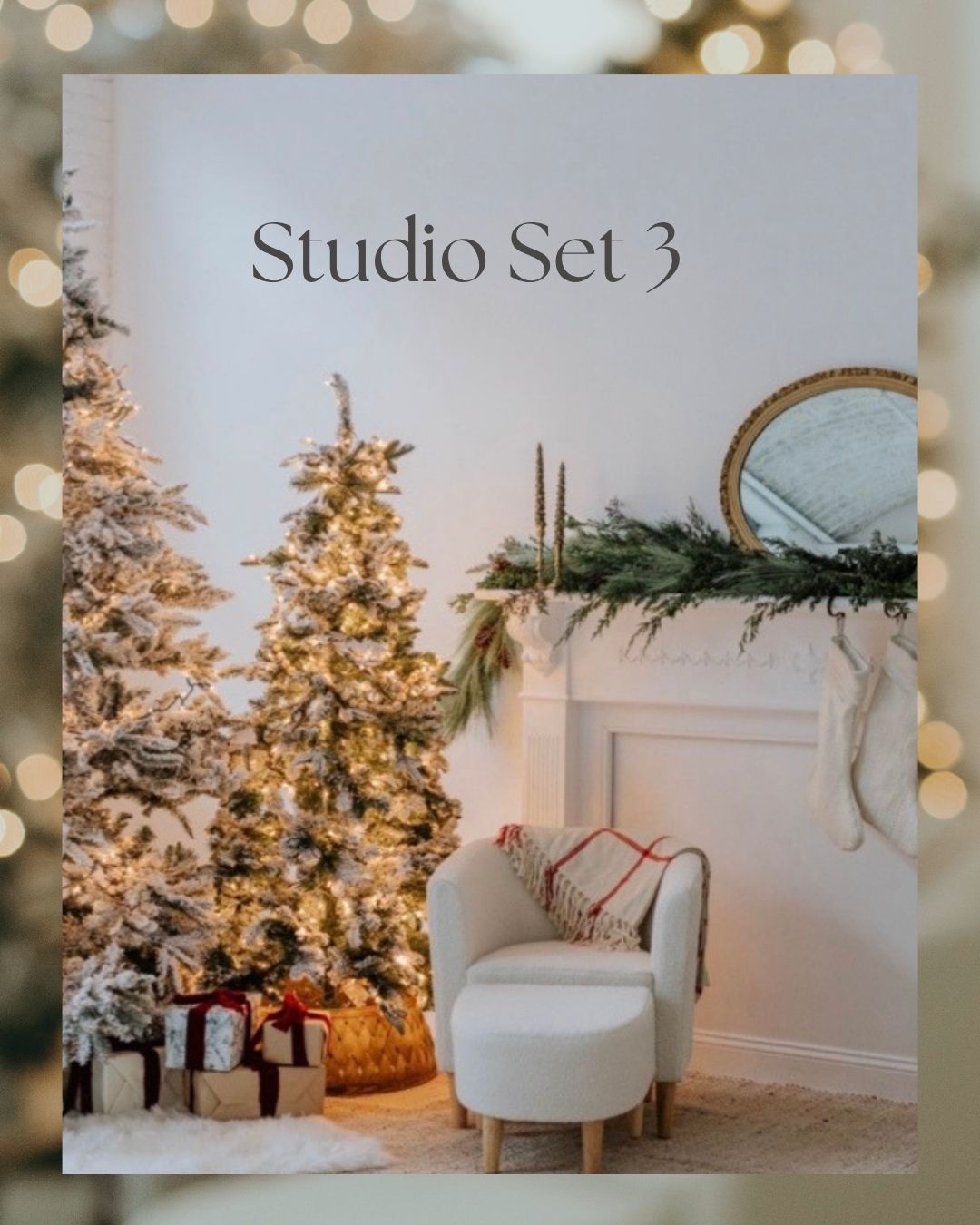 Festive studio set with flocked Christmas tree, glowing lights, white armchair, and decorated fireplace mantel.