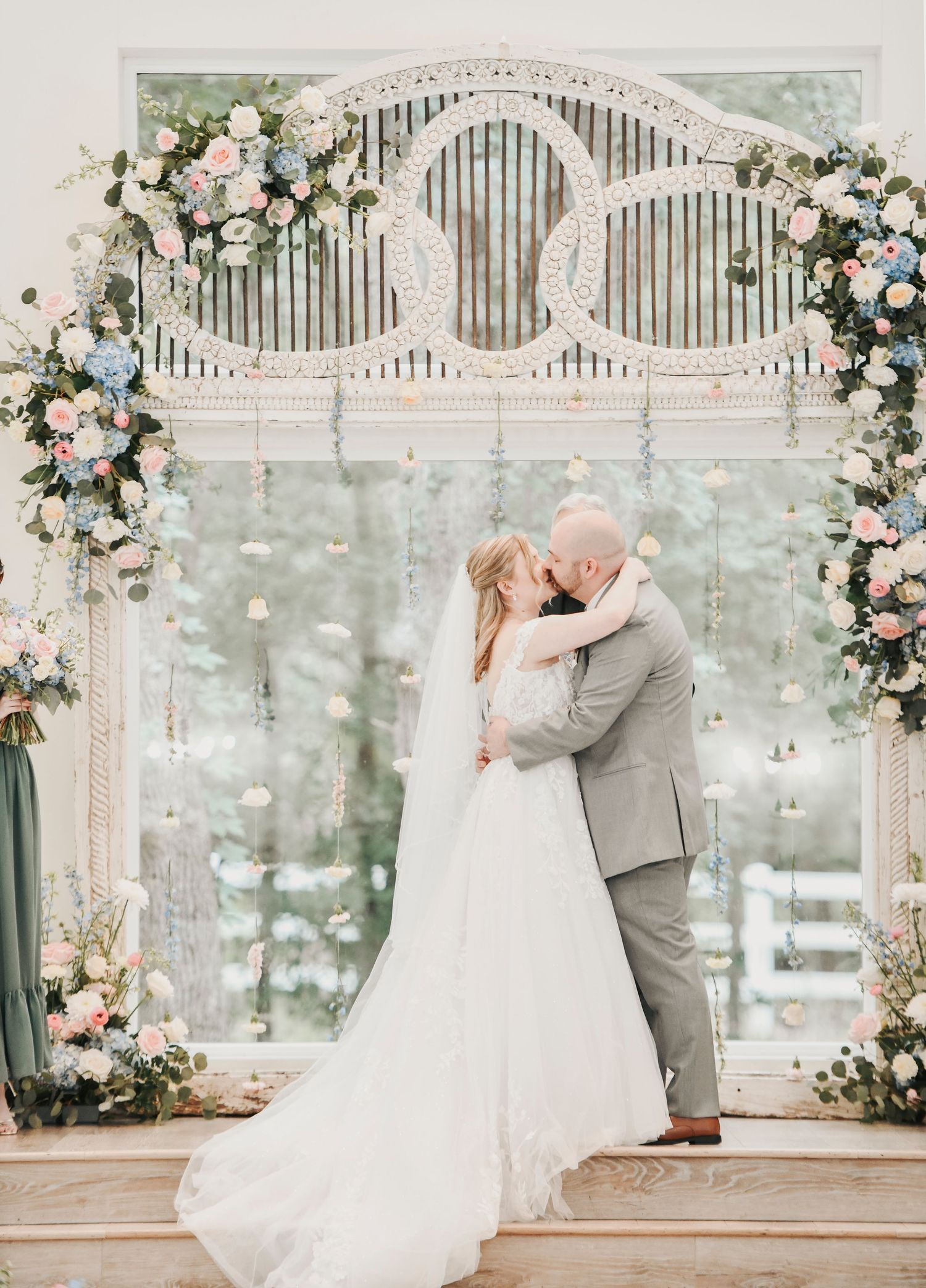 Parker and Kathryn exchanging wedding rings during their ceremony