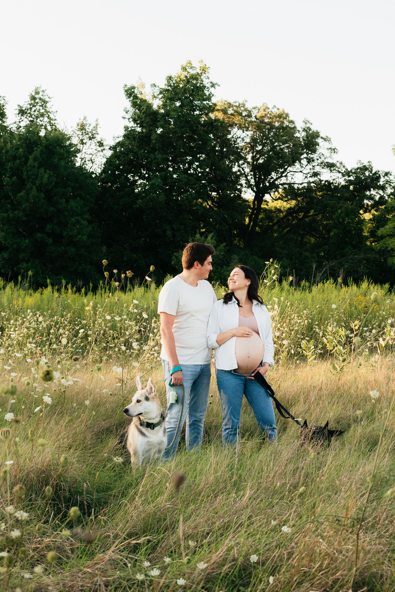 Photo of a husband and wife with dogs