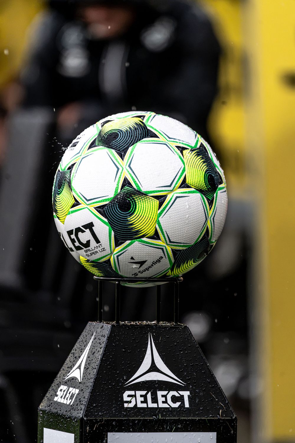 Select branded soccer ball on a display pedestal with the Select logo visible on the stand.