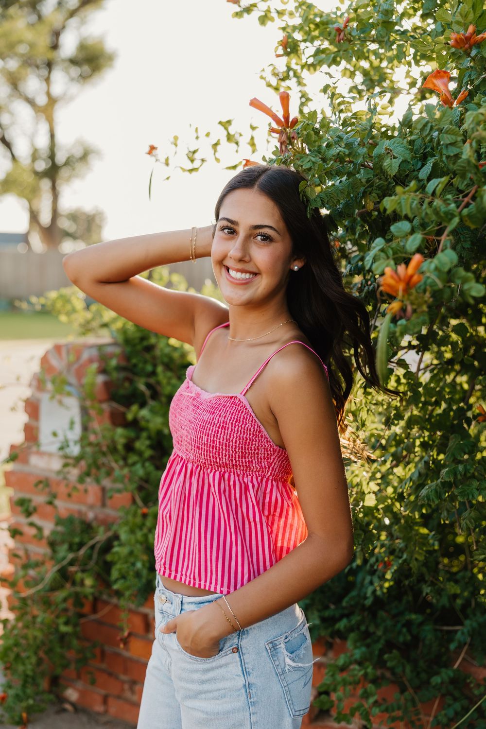 Senior smiling for portraits in Tulia Texas