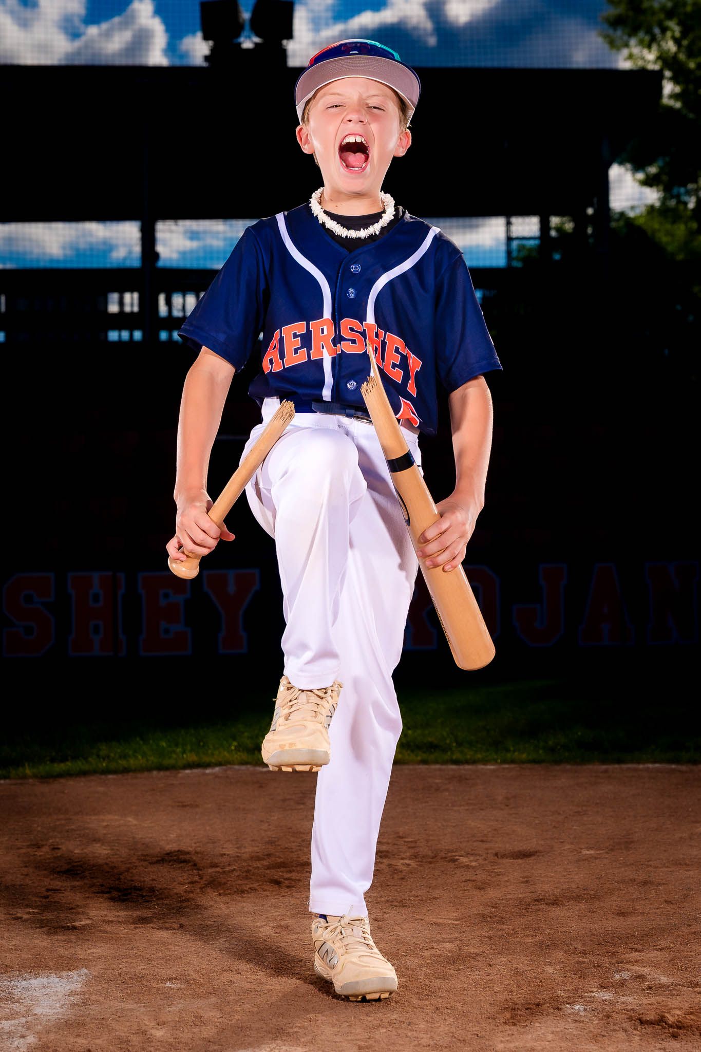 Hershey Little League All-Star player poses with bats at Memorial Field, by Deanna Fox, SportsFox Photography based in Hershey PA