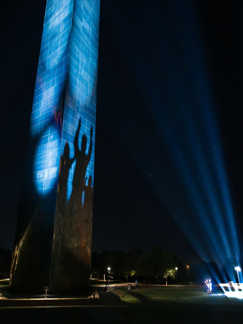 Lights cast the shadows of playful visitors on the St. Louis Gateway Arch on Route 66 in Missouri. June 13, 2026. Photo: David J. Manning.