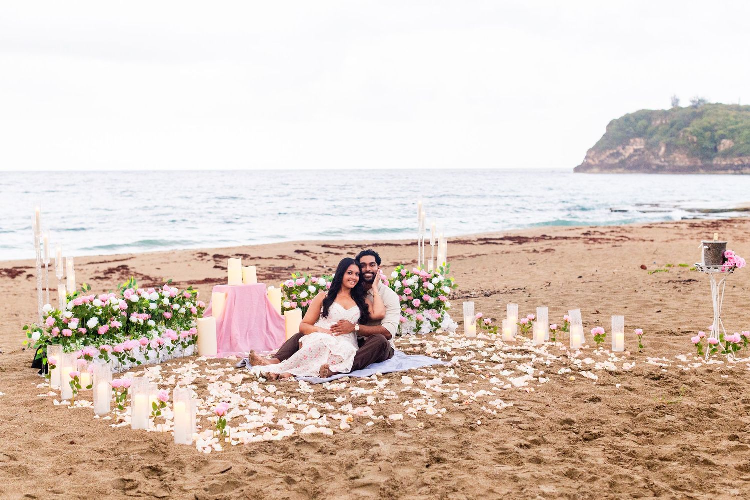 Marriage proposal on the beach with candles and flowers. Playa Guajataca, Isabela, Puerto Rico.