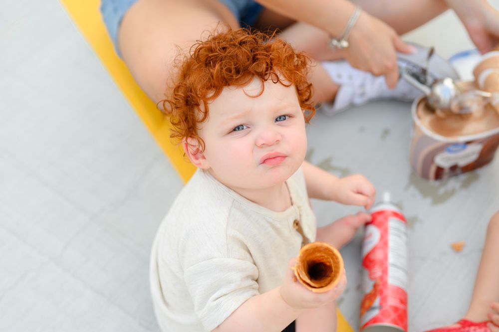 Lifestyle motherhood session in Lynchburg, Virginia capturing genuine hugs, laughter, and connection.