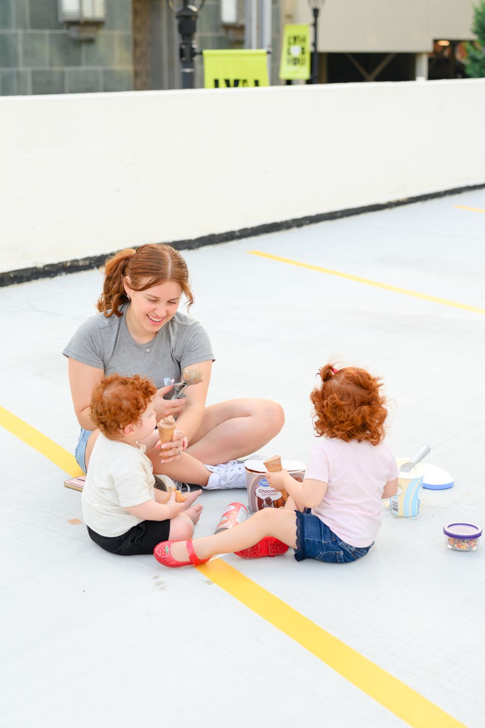 Lifestyle motherhood session in Lynchburg, Virginia capturing genuine hugs, laughter, and connection.