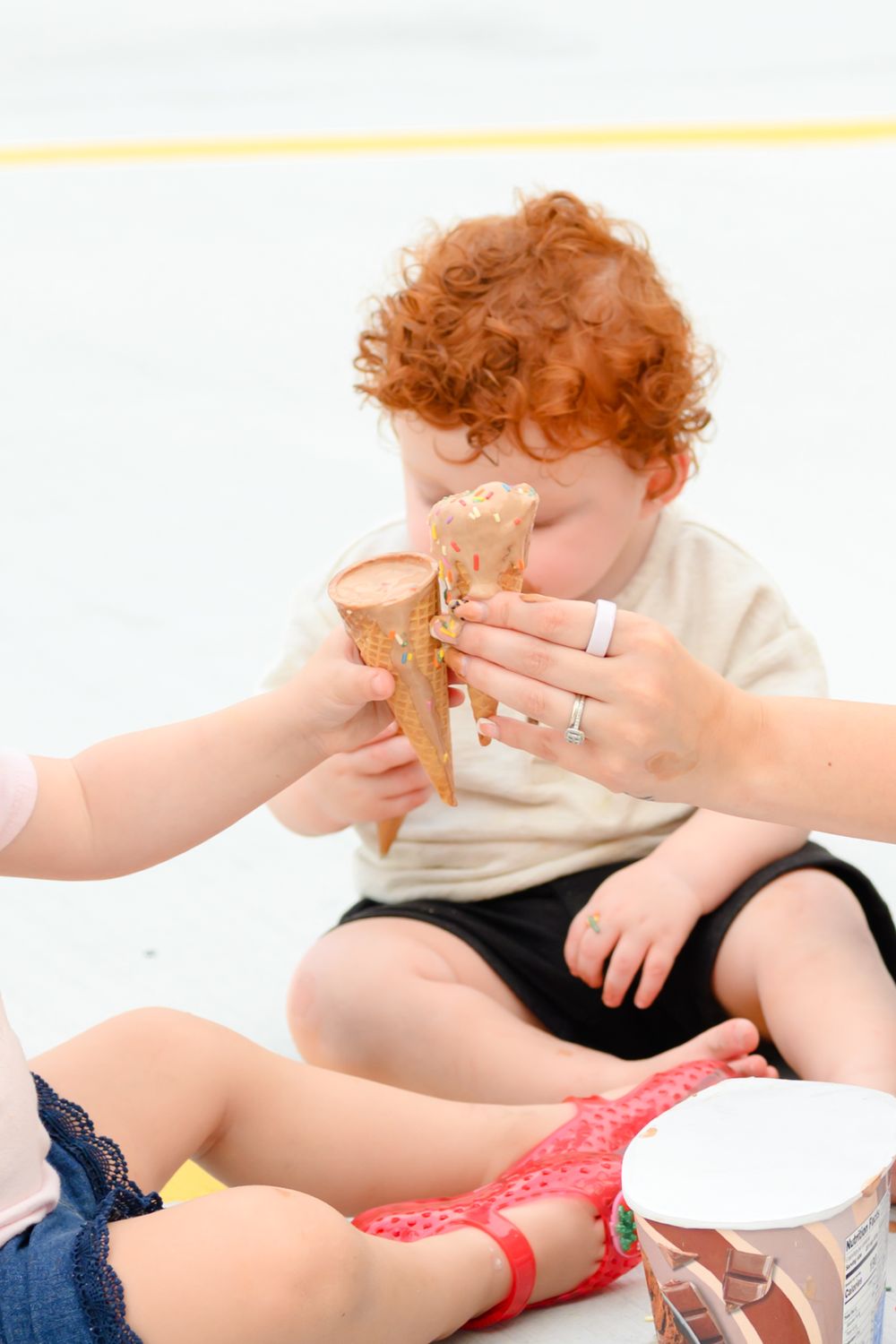 Lifestyle motherhood session in Lynchburg, Virginia capturing genuine hugs, laughter, and connection.