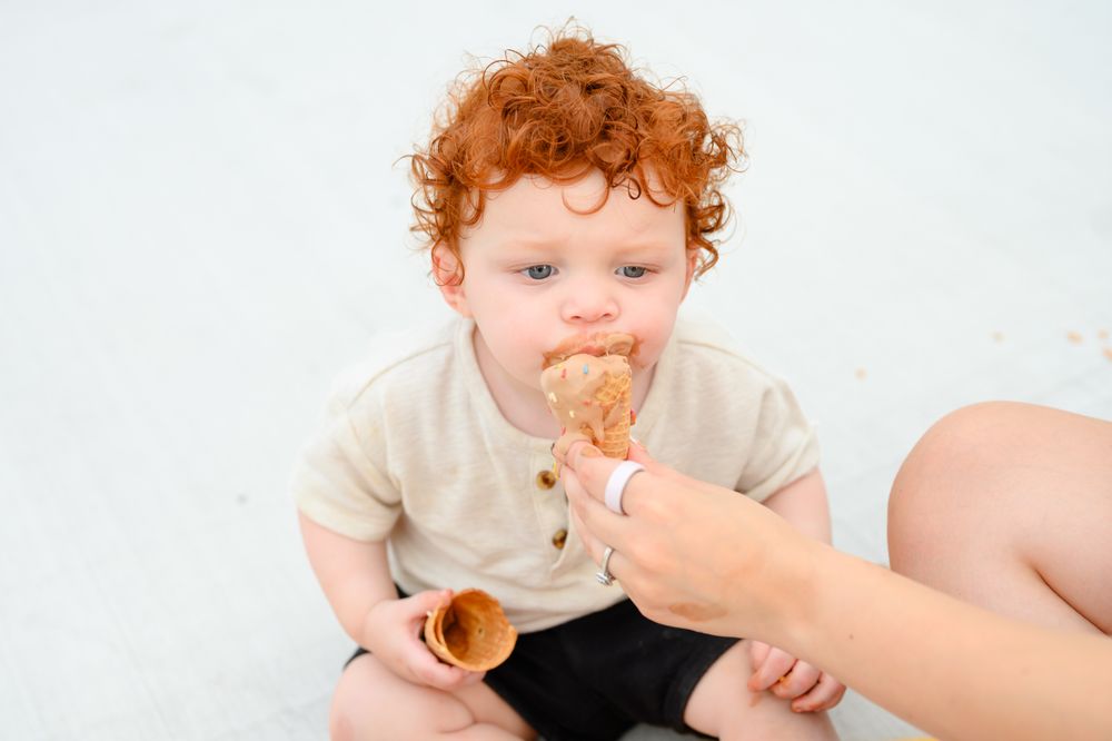Lifestyle motherhood session in Lynchburg, Virginia capturing genuine hugs, laughter, and connection.