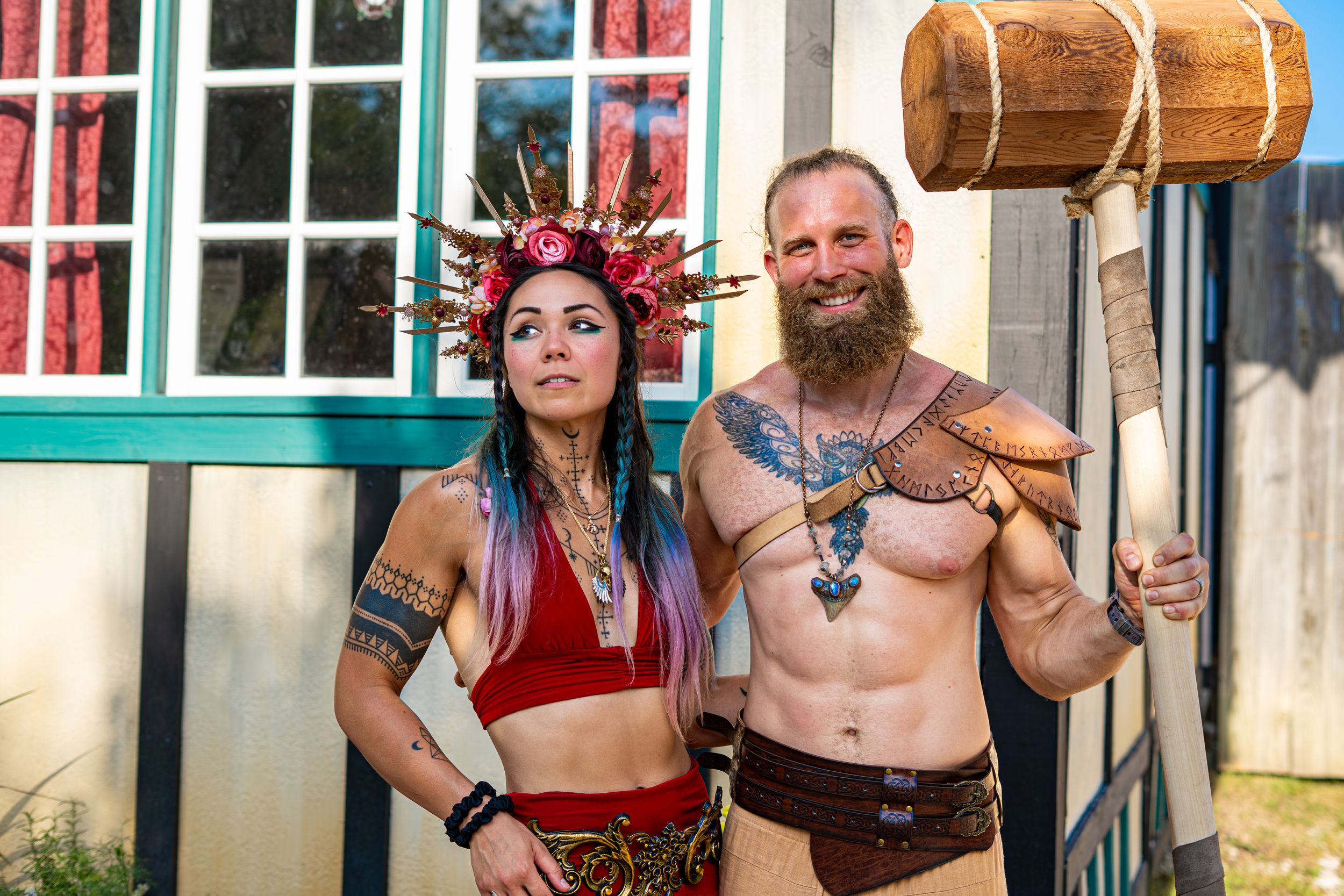 Costumed couple posing together at a renaissance faire event
