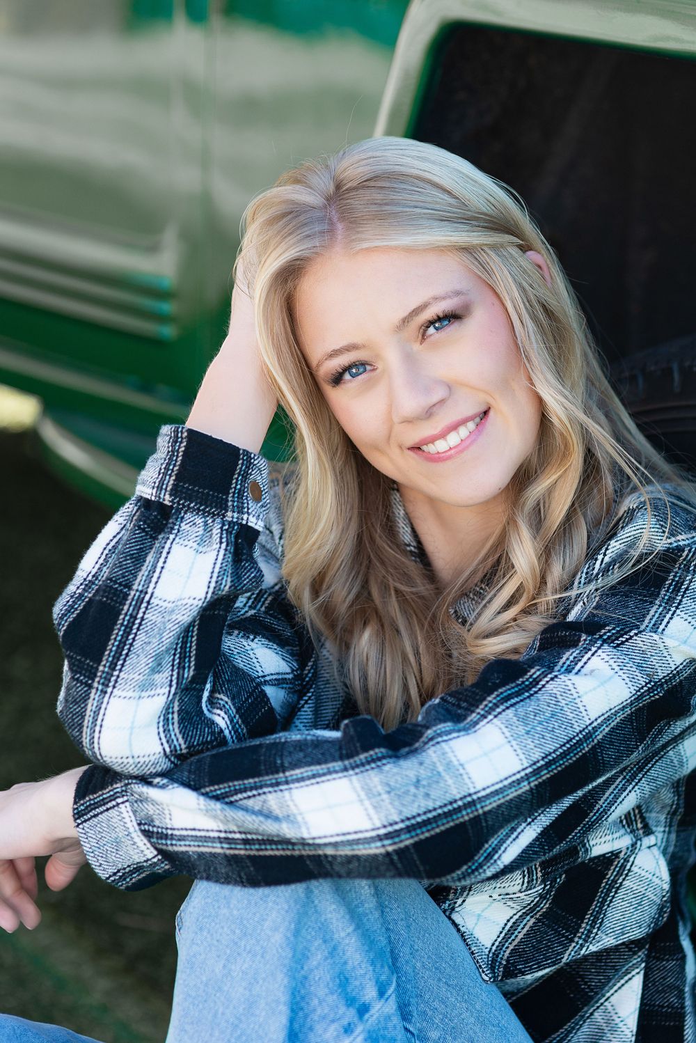 High school senior portrait by a vintage truck
