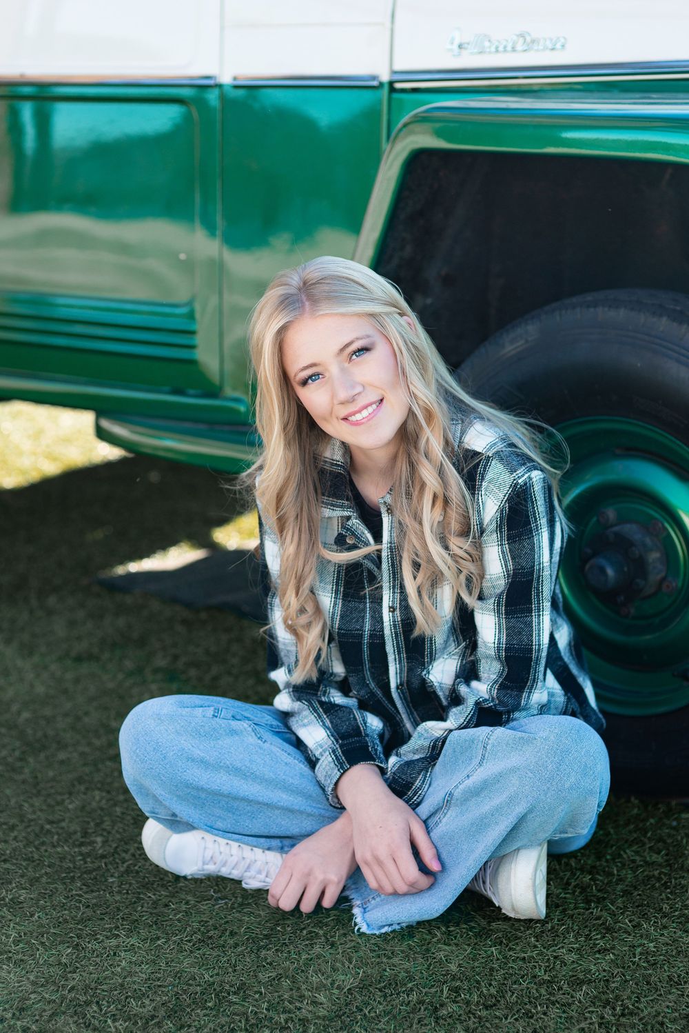 High school senior portrait by a vintage truck