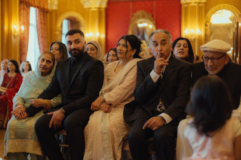 Documentary photo of family at a wedding ceremony