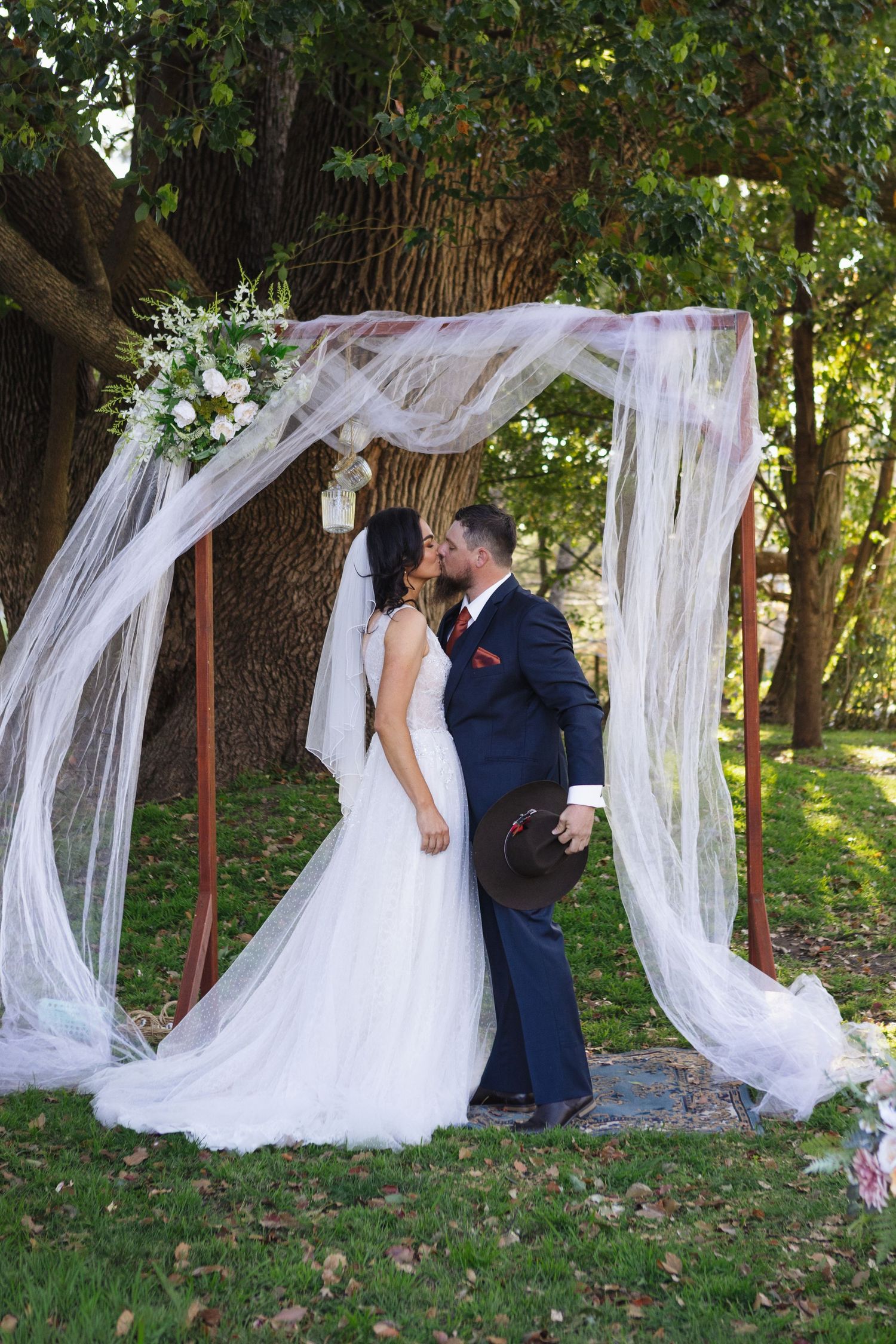 Kylie and Jono’s wedding ceremony beneath an oak tree at Moonan Cottage near Scone NSW