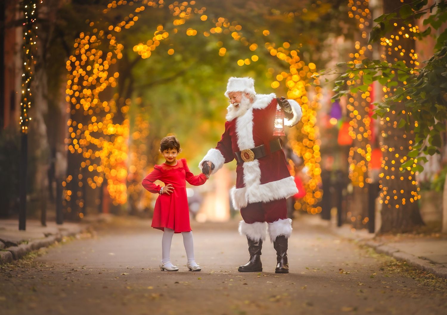 Santa Claus and young girl sharing a special moment during a Christmas photo session in South Jersey.