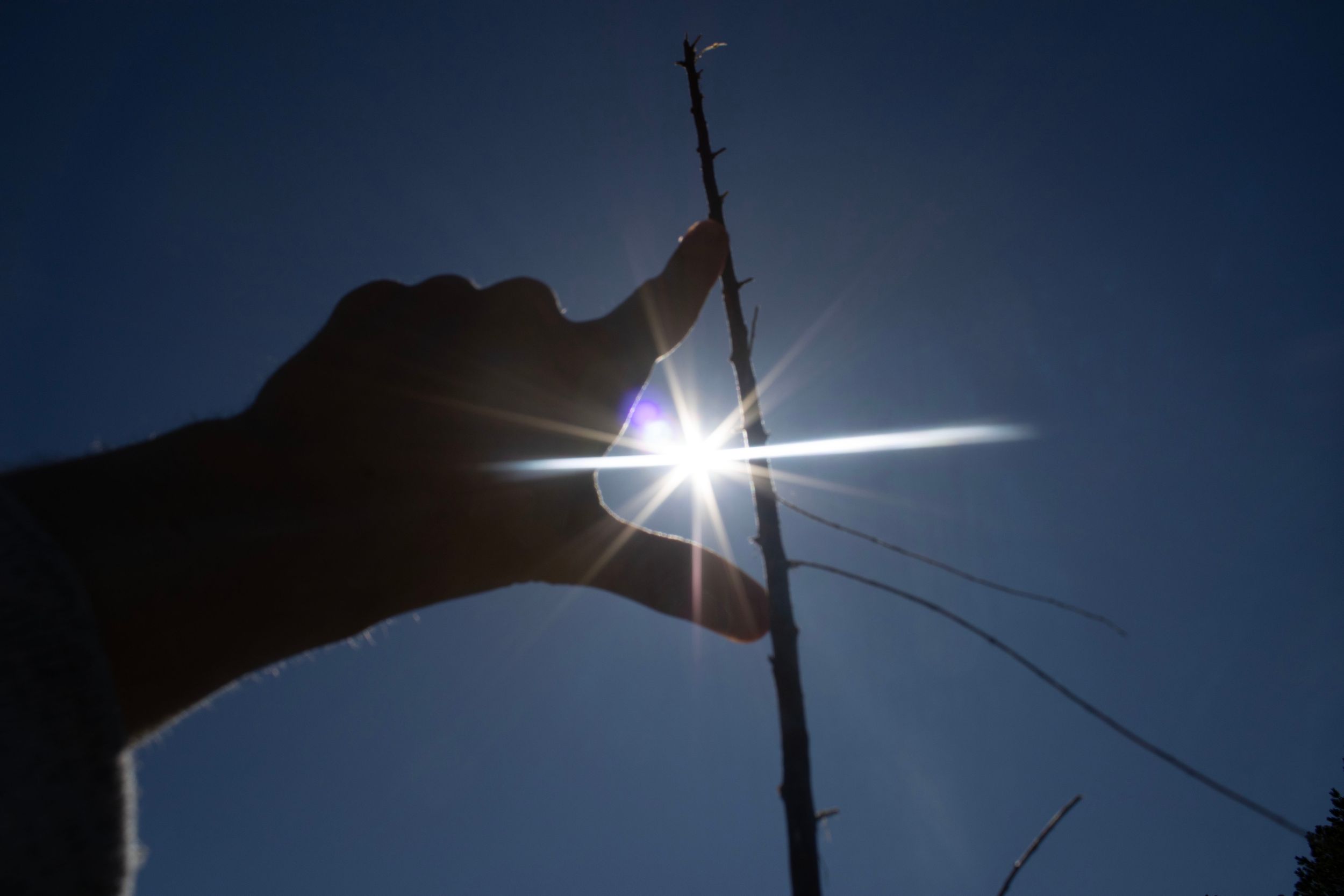 The sun shining through a triangle.
