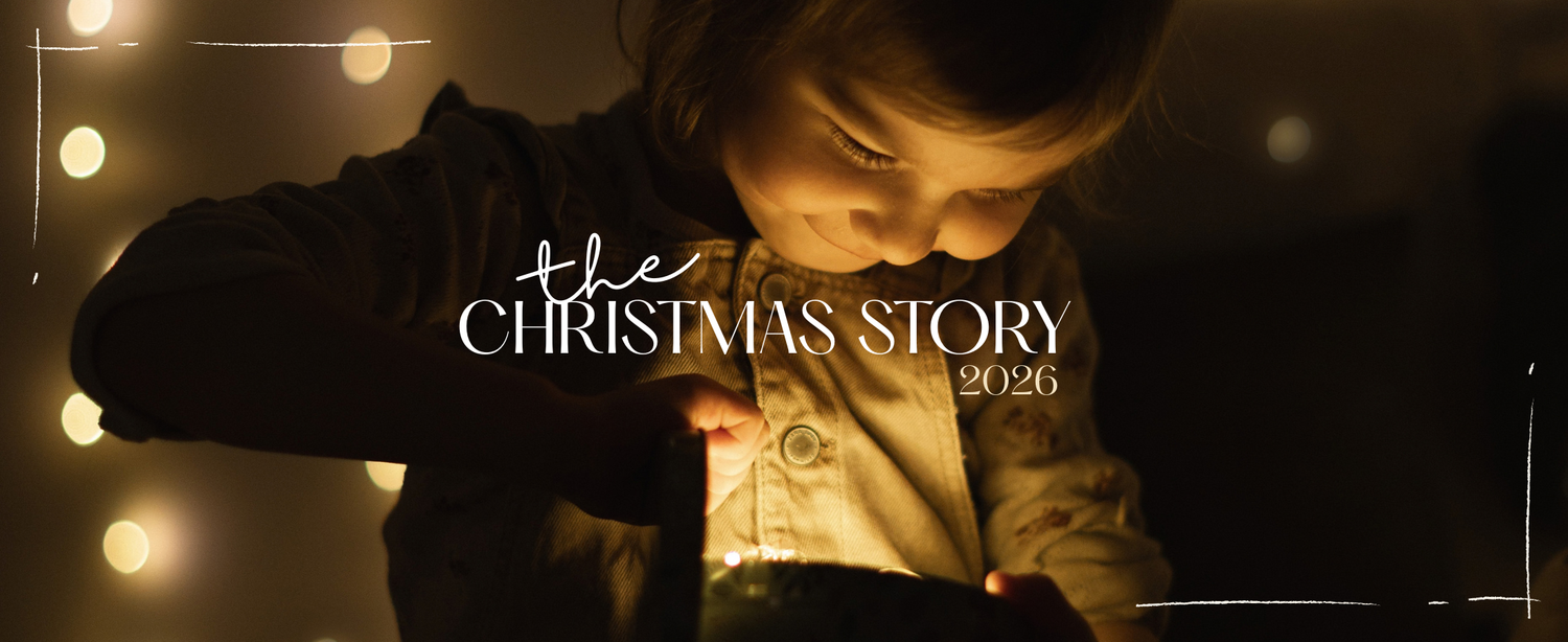 Child gazing at glowing light with The Christmas Story 2026 text overlay on dark bokeh background.