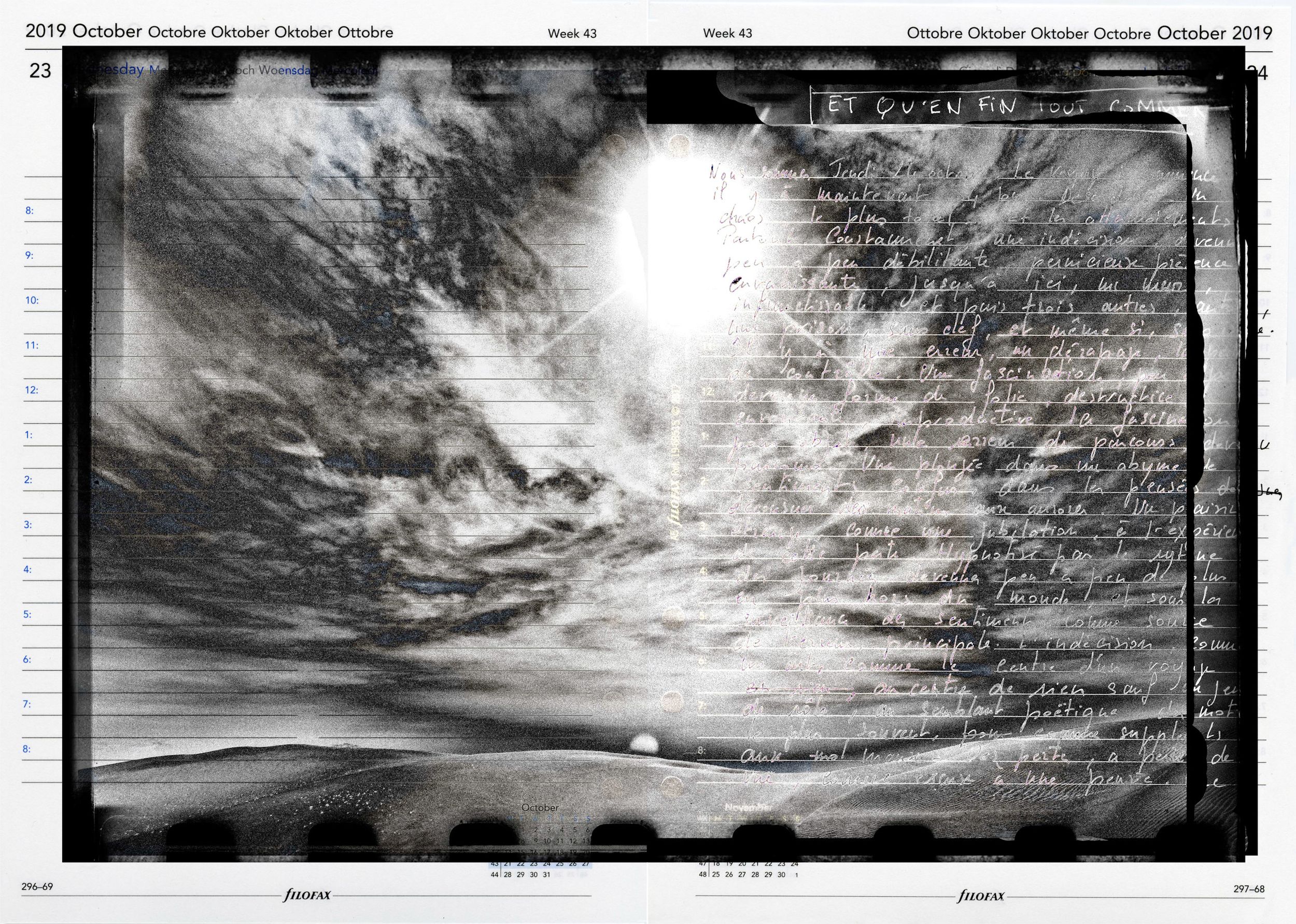 A dramatic black and white calendar page for October 2019 featuring a surreal stormy sky with glowing light and handwritten text overlay.