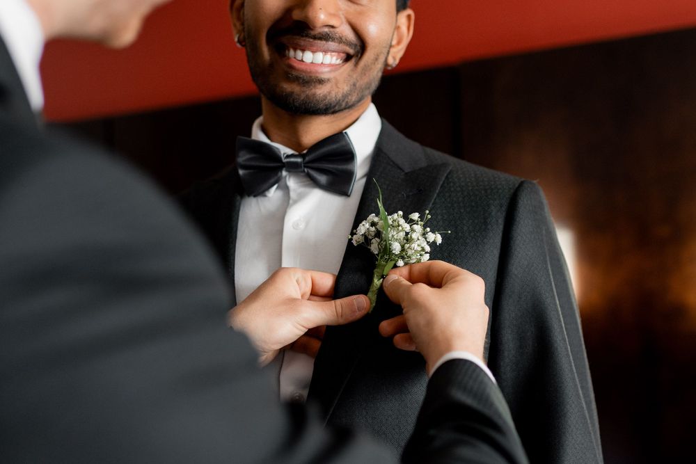 groom getting ready for his multicultural wedding