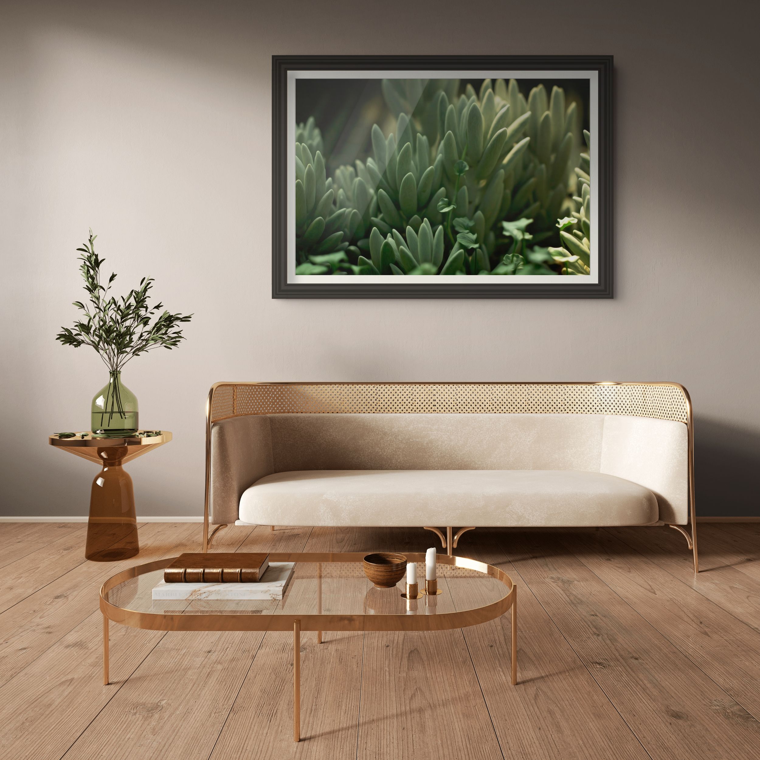 Modern living room with rattan sofa, oval coffee table, and framed green succulent botanical art print on beige wall.