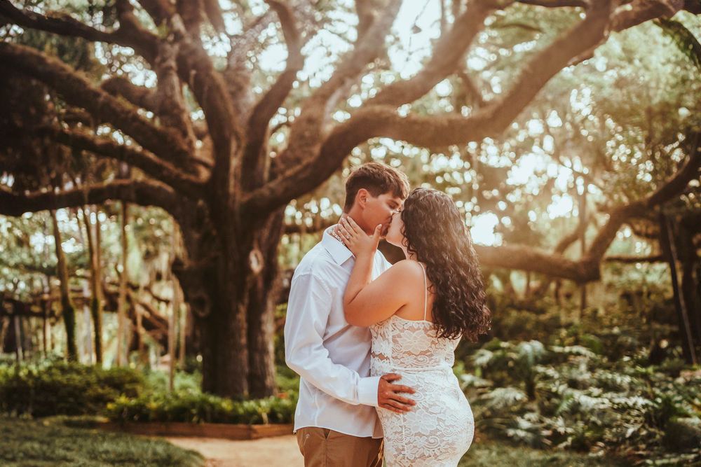 couple engagement photography at Washington Oaks State Park in Saint Augustine and Palm Coast Florida featuring oak trees and gardens