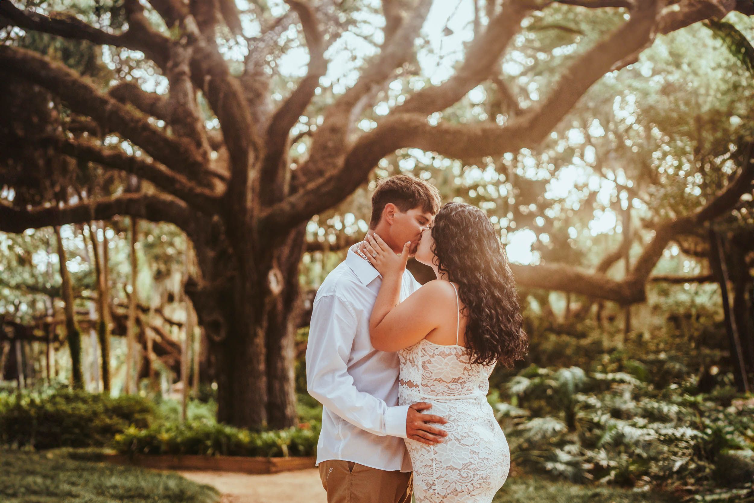 couple engagement photography at Washington Oaks State Park in Saint Augustine and Palm Coast Florida featuring oak trees and gardens