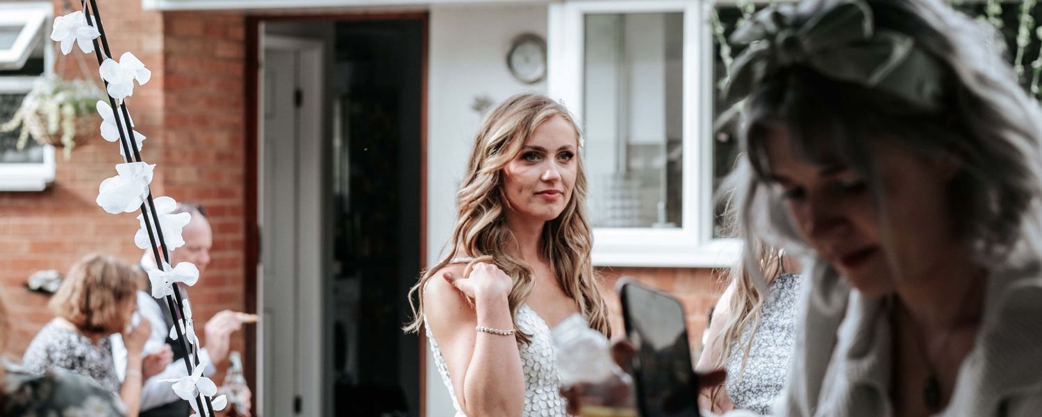 Bride candid photo following home wedding