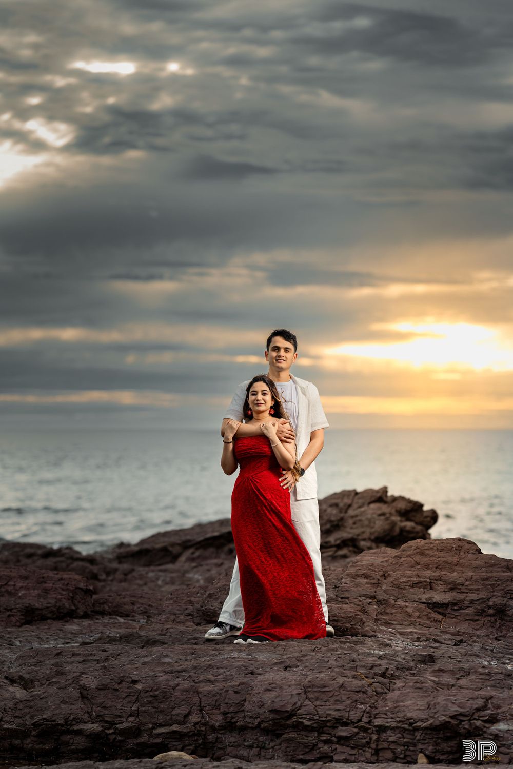 Couple walking hand-in-hand through a peaceful park, captured during a pre-wedding photoshoot with soft natural light