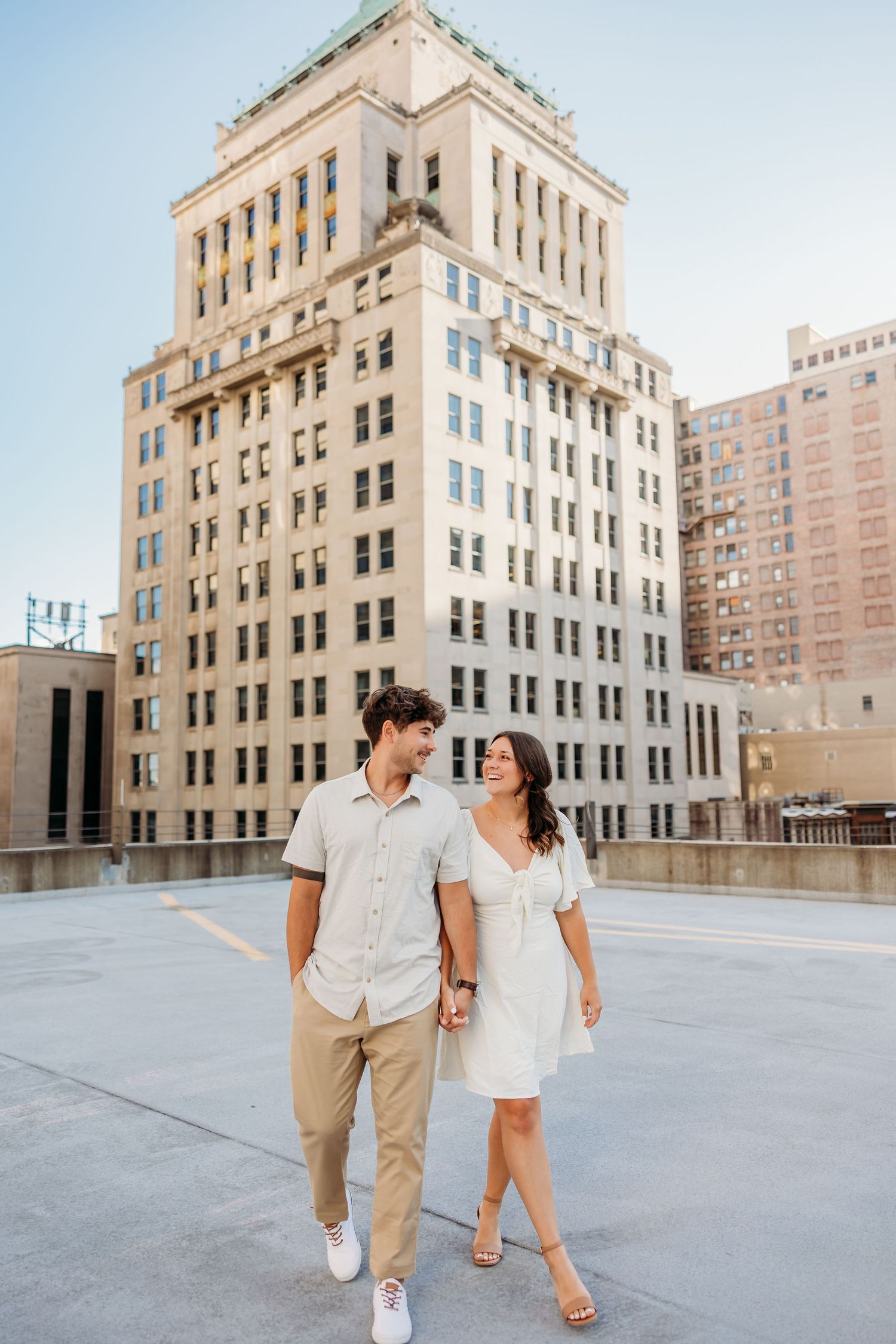 Portraits of a fun engagement shoot on a rooftop in Cincinnati.