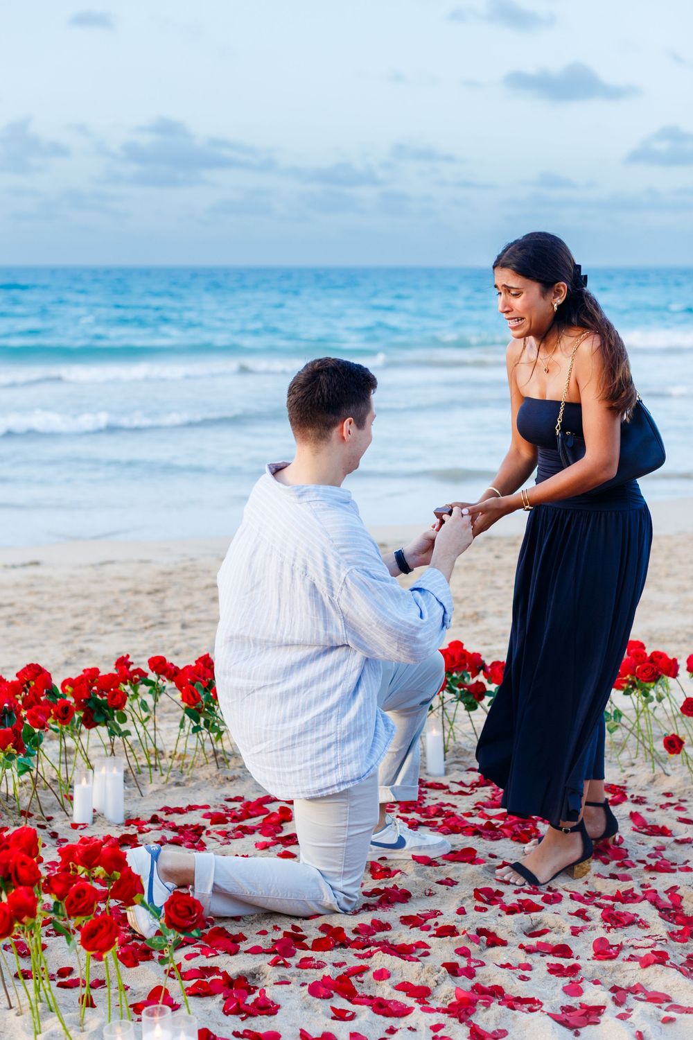 Marriage proposal on the beach. San Juan, Puerto Rico.