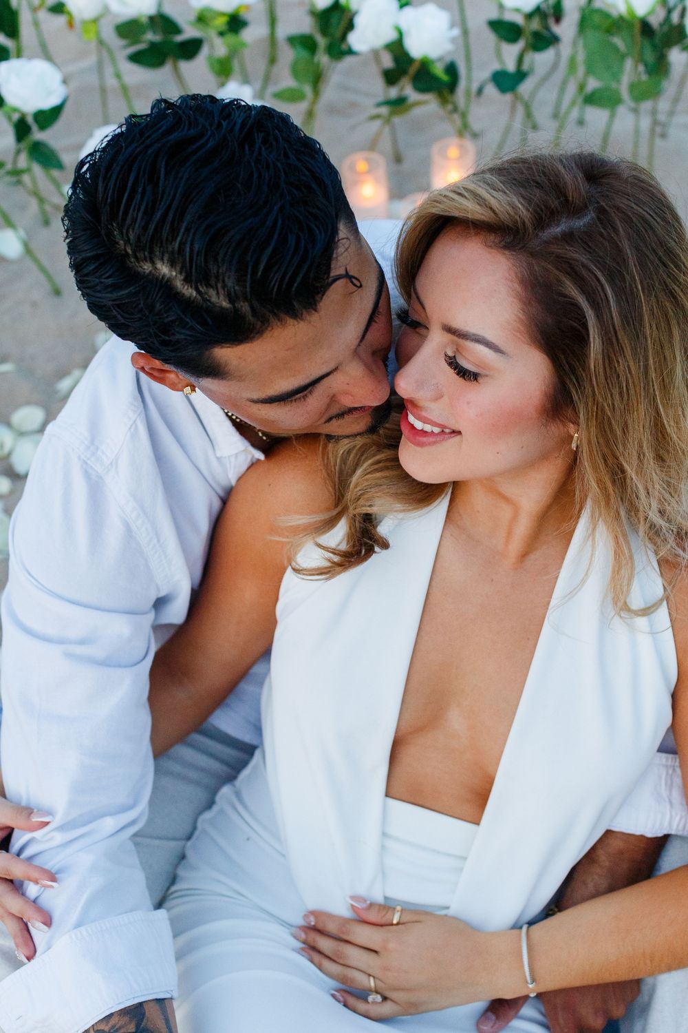 Couples portrait. Marriage proposal on the beach. San Juan, Puerto Rico.