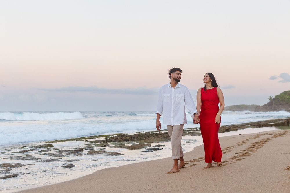 Couples portrait on the beach at Kikita Beach in Dorado, Puerto Rico.