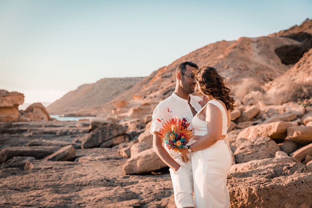 Mallorca engagement photoshoot on a rocky beach in Mallorca.