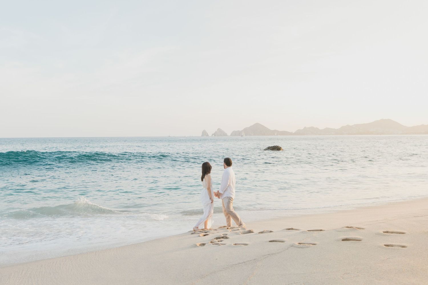 Expectant parents admiring the breathtaking views of Los Cabos