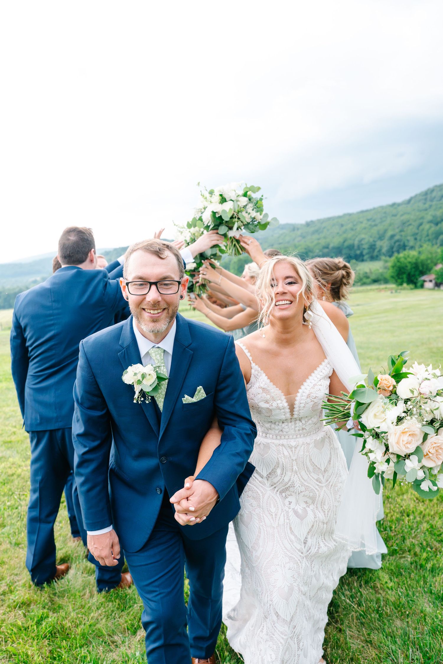 A dressed-up couple shares an intimate moment outdoors.