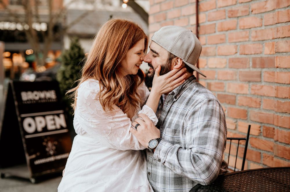 Couple sits on a patio on a downtown Walla Walla sidewalk
