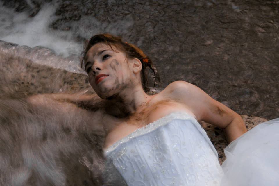 wedding photography
trash the dress photography 
bride laying in water