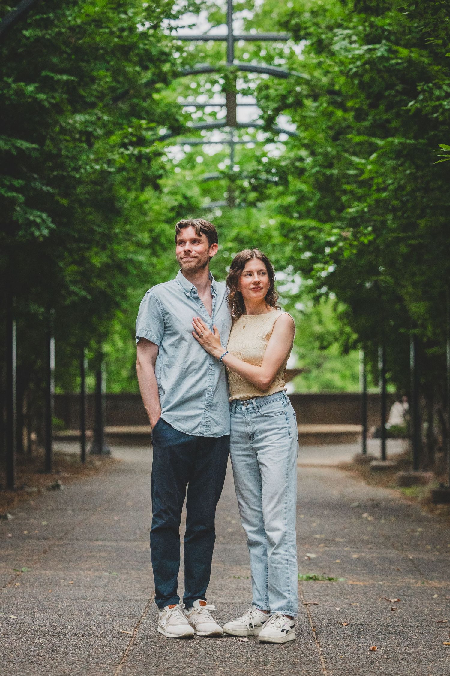 Couple poses under archways at the Meridian Hill Park / Malcolm X Park