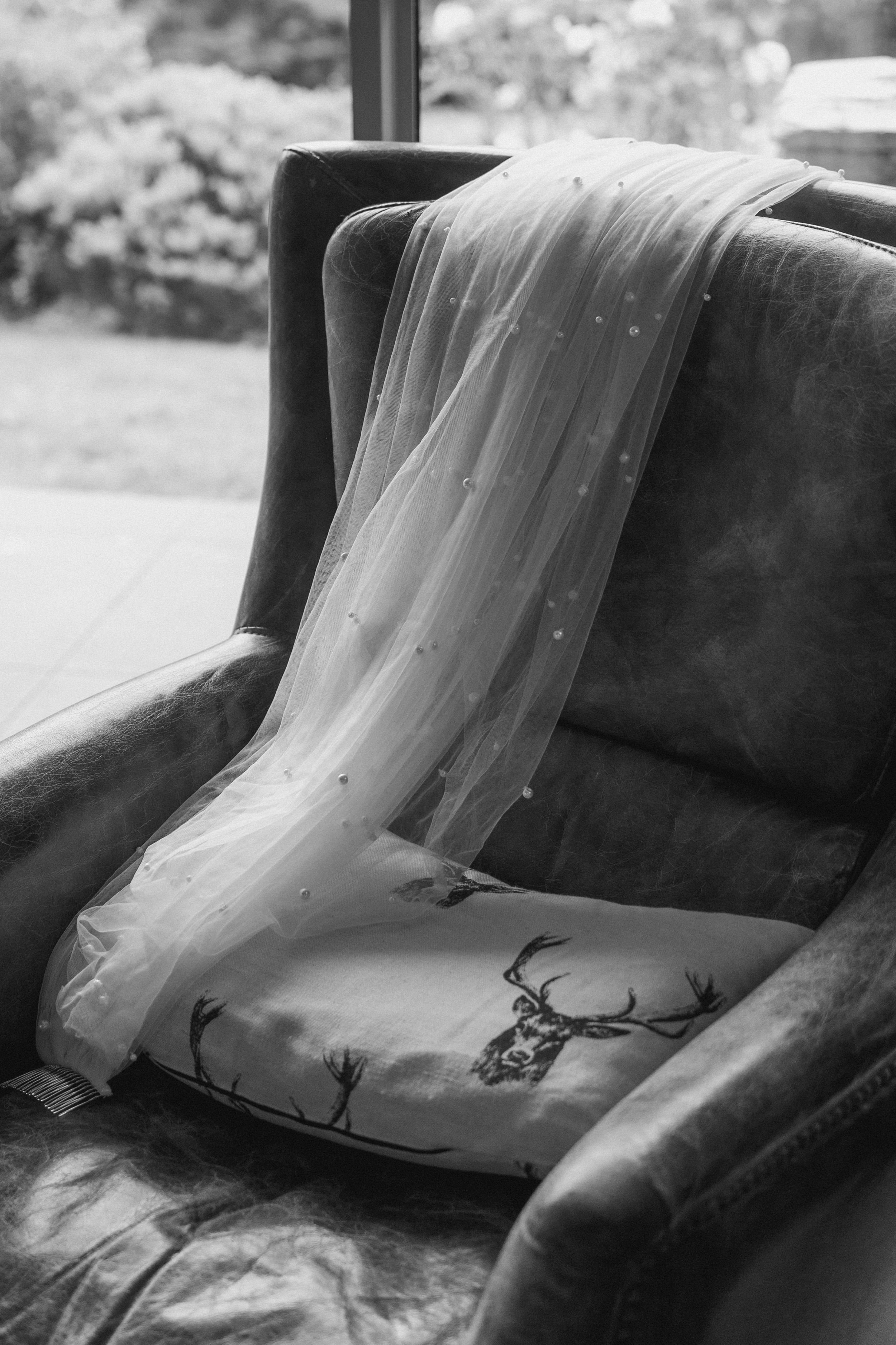 veil draped over a chair
