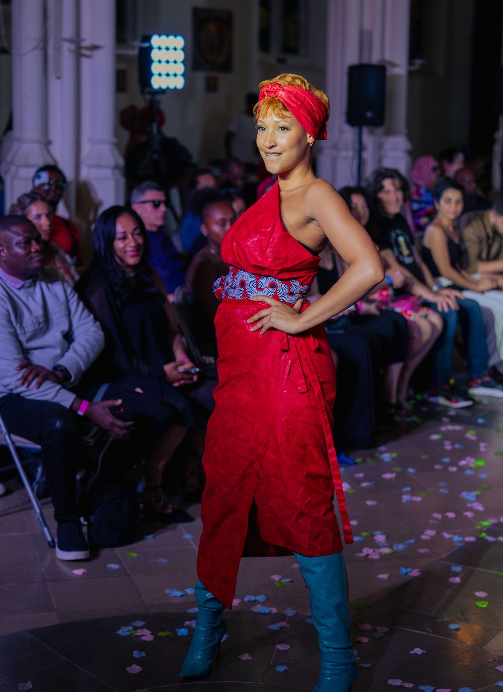 female runway in red attire