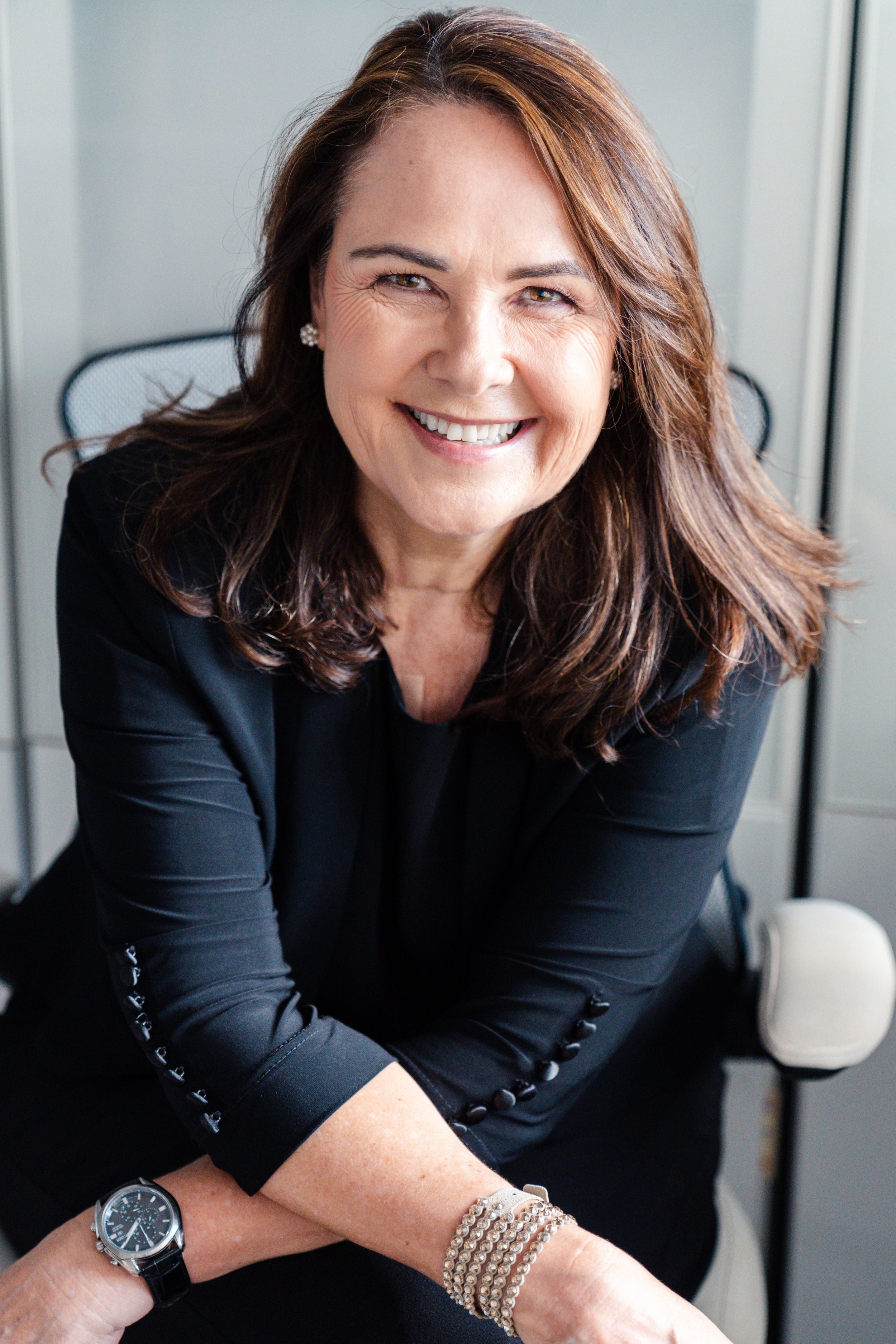 Professional headshot from a branding shoot in Brisbane, showcasing a high-quality, well-lit image of the subject