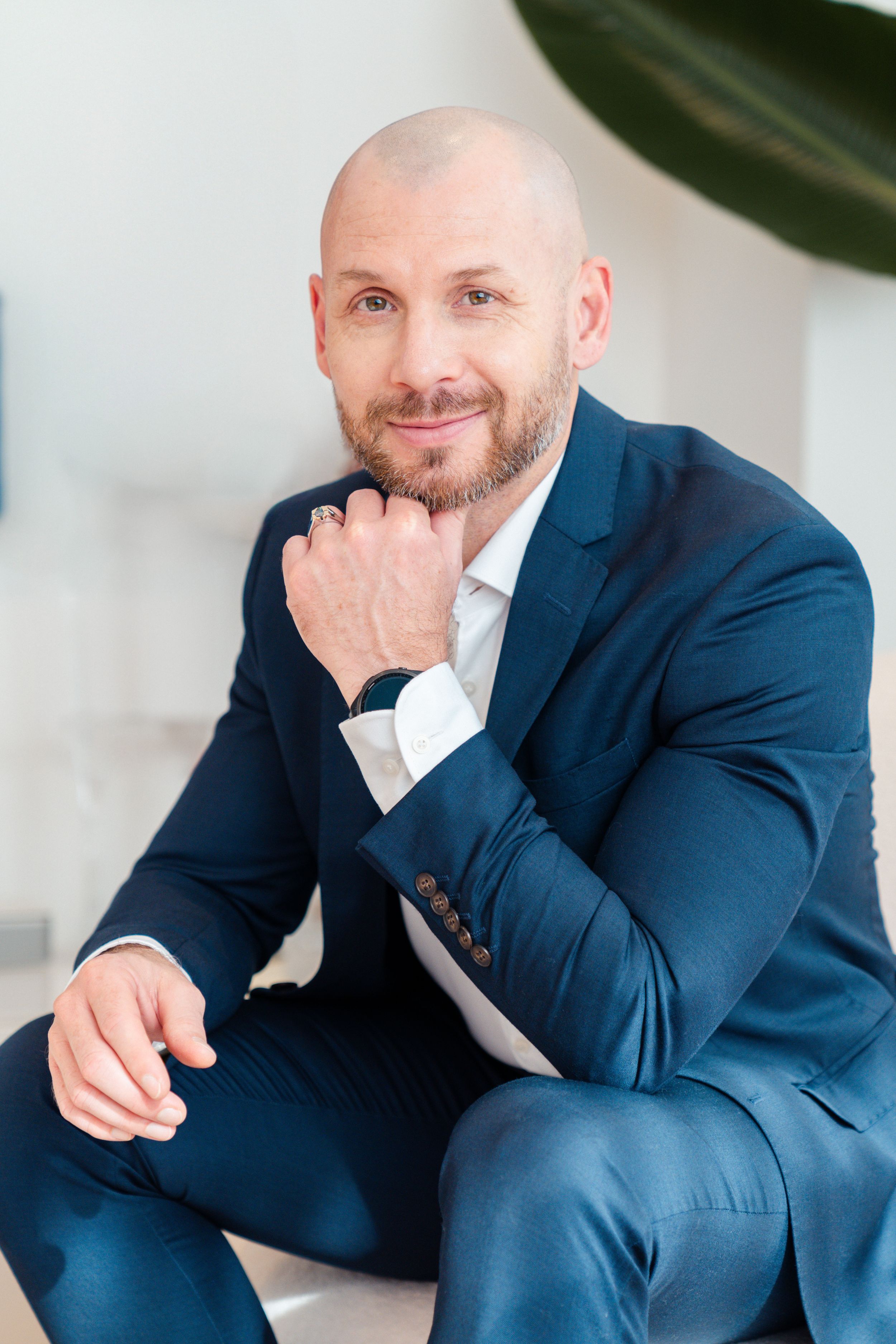 Professional headshot from a branding shoot in Brisbane, showcasing a high-quality, well-lit image of the subject