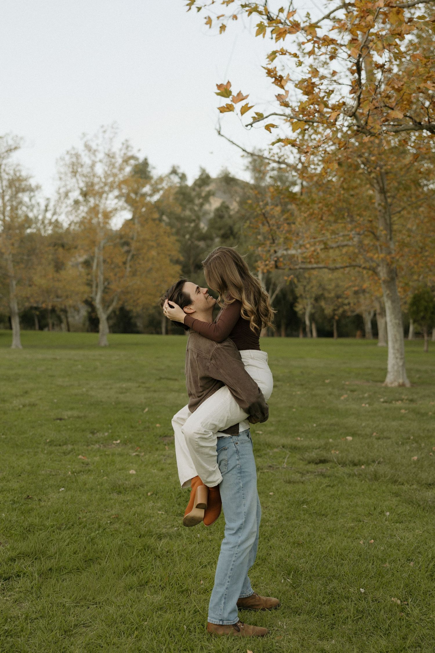 Happy beach couple image taken by Leah Anne Kopp Photography