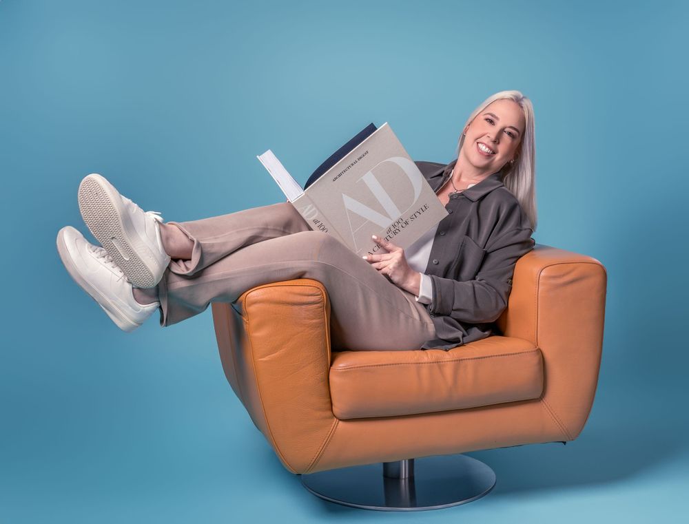 Multiple angles of someone lounging comfortably on a tan leather chair against blue background.