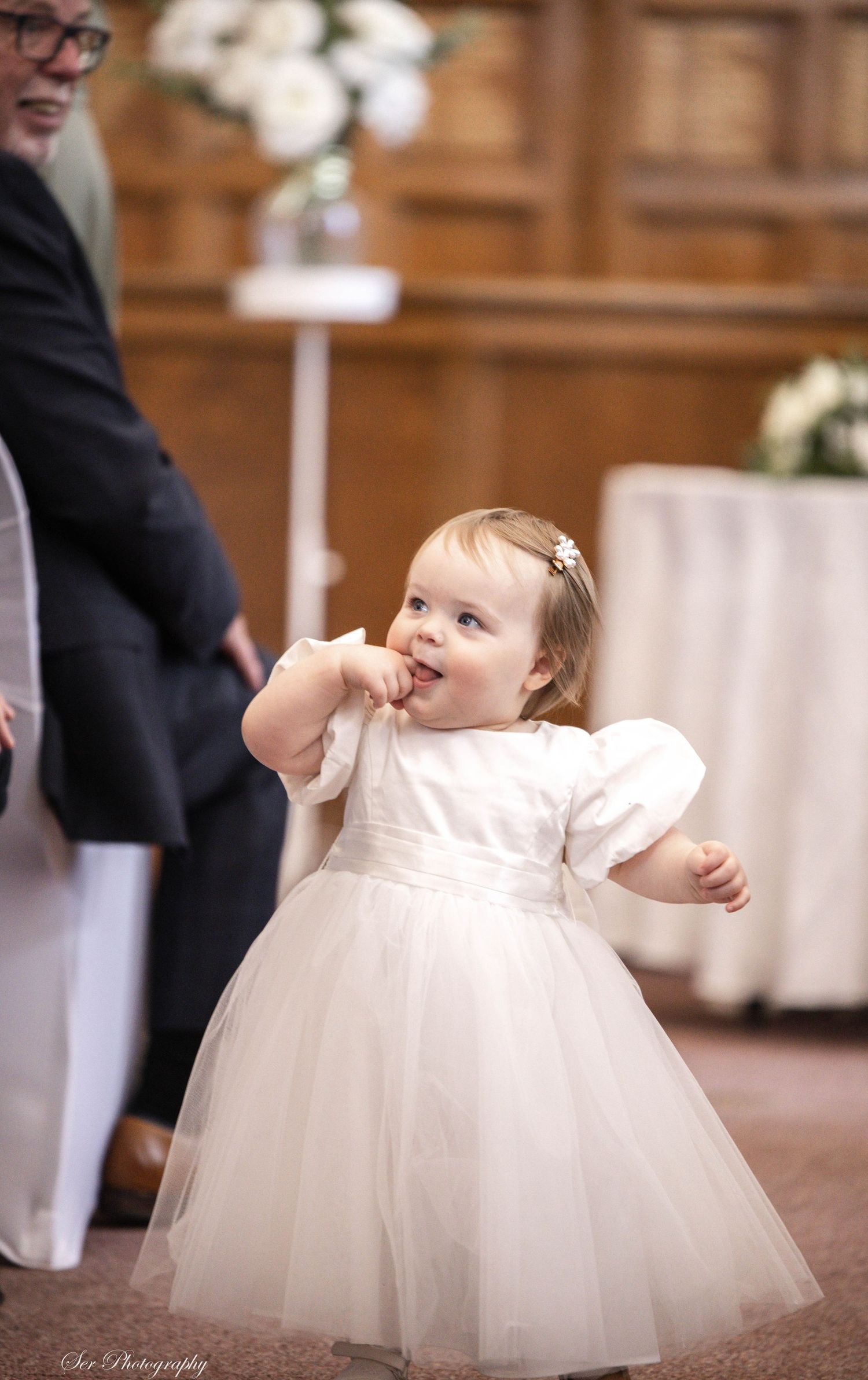 Little girl as a bridesmaid at a wedding