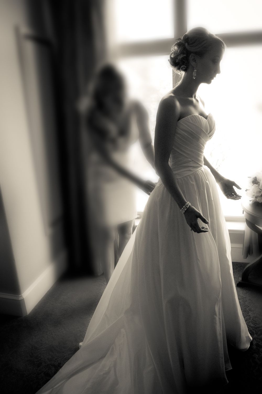 Ethereal black and white images of a bride in flowing wedding dress.