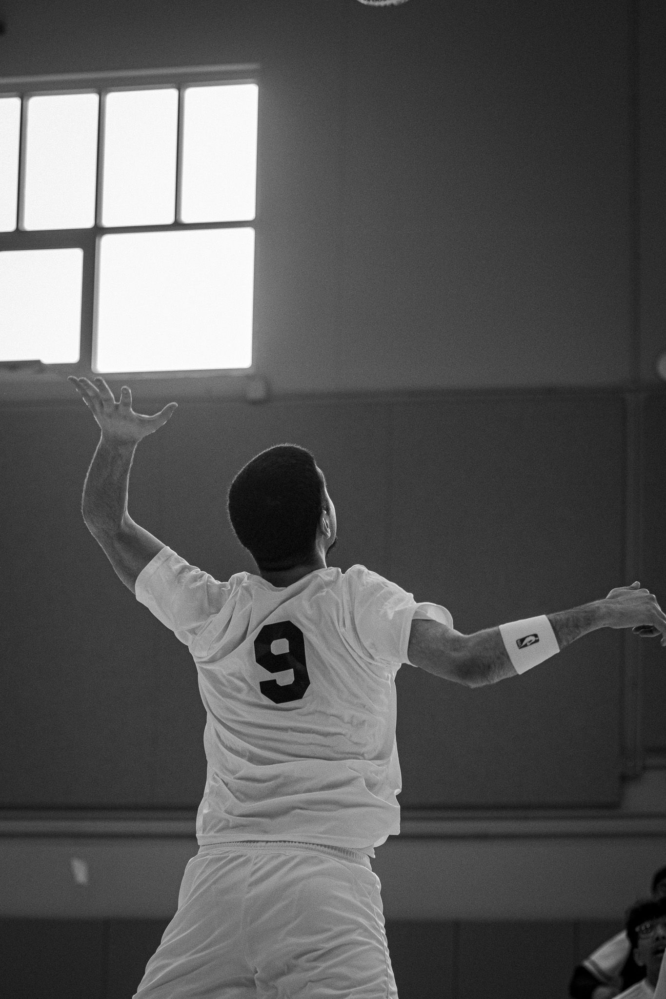 CPSA's #9 striking a volleyball.