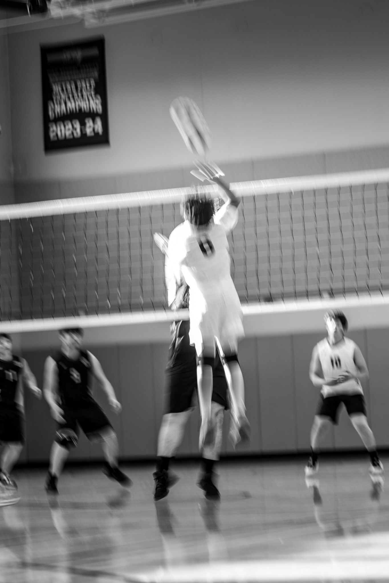 CPSA's #8 striking a volleyball