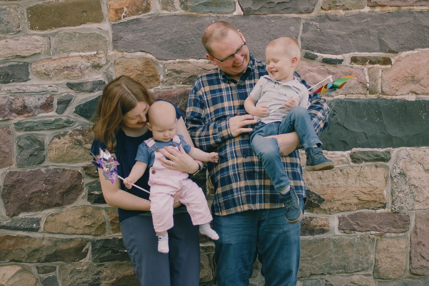 a family lovingly gazes at one another
