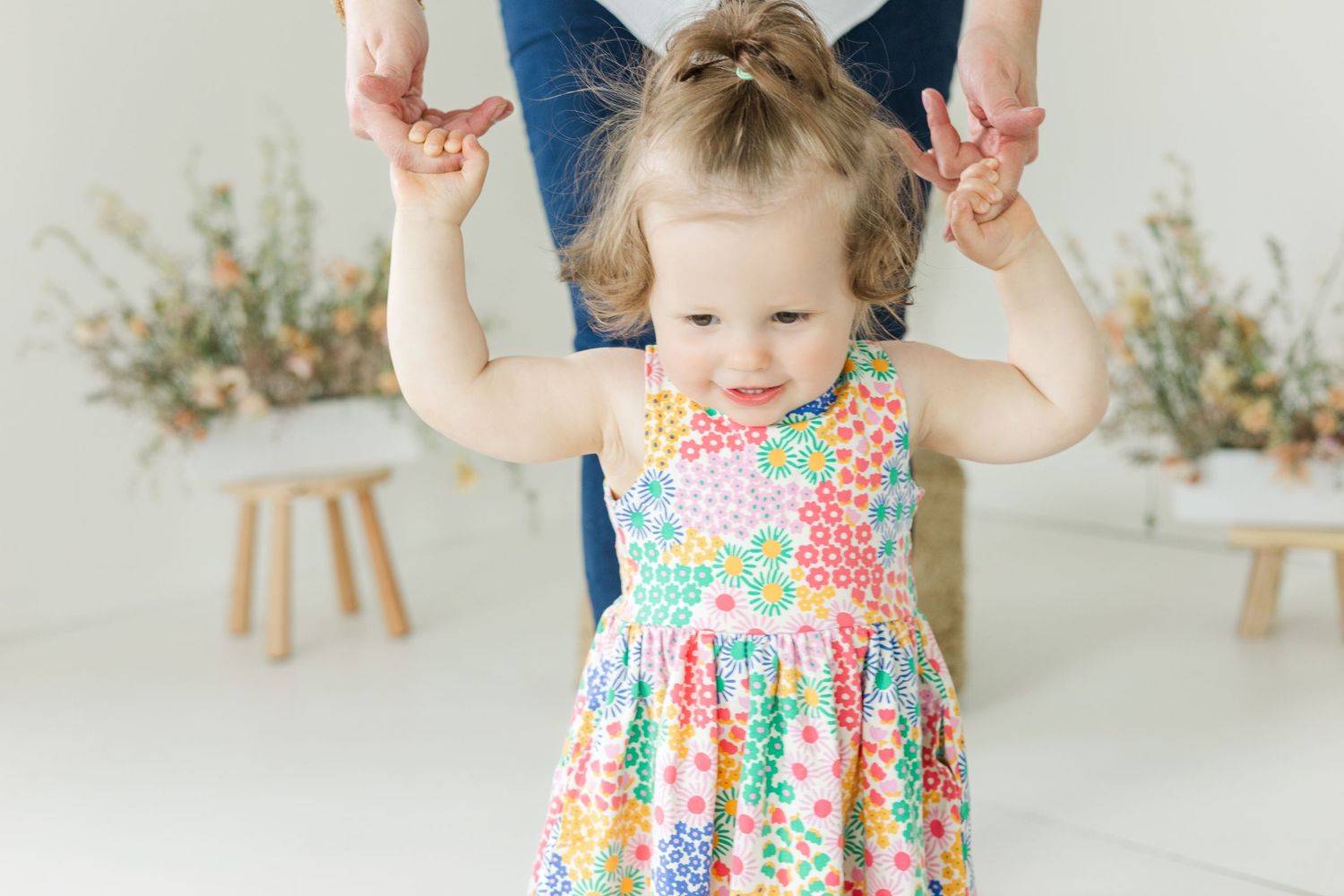 A colorful floral dress and lilac leggings outfit shown in multiple angles on a light background.