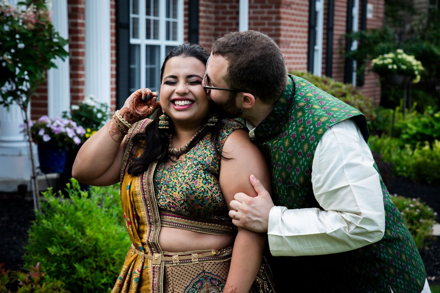 Festive outdoor celebration with traditional Indian attire and joyful moments.